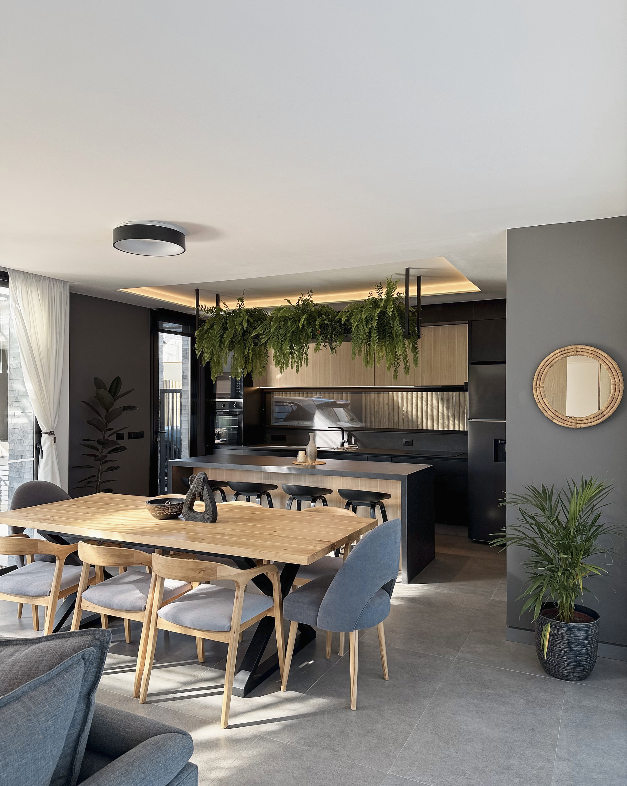 Estar, comedor y cocina integrados de Casa 9 Greenland
